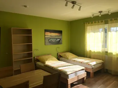 Ein Bett oder Betten in einem Zimmer der Unterkunft Ferienwohnung Mayer