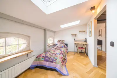 Ein Bett oder Betten in einem Zimmer der Unterkunft Le Remise