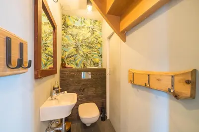 Ein Badezimmer in der Unterkunft Le Remise