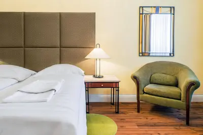 Ein Bett oder Betten in einem Zimmer der Unterkunft Hotel-Pension Michele
