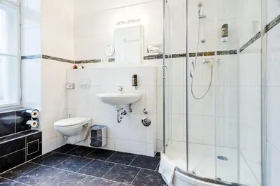 Ein Badezimmer in der Unterkunft Hotel-Pension Michele