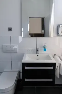 Ein Badezimmer in der Unterkunft Hotel Landhaus Schlachtensee