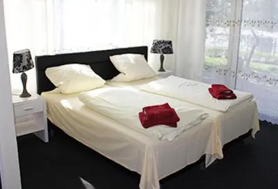 Ein Bett oder Betten in einem Zimmer der Unterkunft Apartment-Hotel-Dahlem