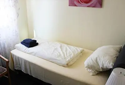 Ein Bett oder Betten in einem Zimmer der Unterkunft Apartment-Hotel-Dahlem