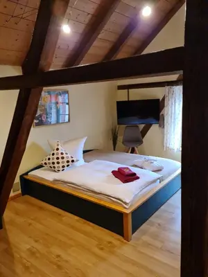Ein Bett oder Betten in einem Zimmer der Unterkunft Zur Goldenen Kartoffel