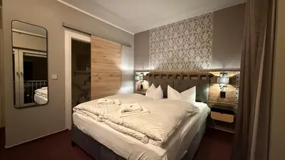 Ein Bett oder Betten in einem Zimmer der Unterkunft Hotel Annablick