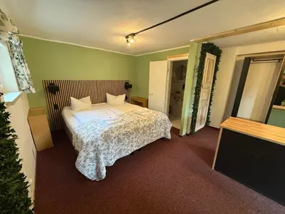 Ein Bett oder Betten in einem Zimmer der Unterkunft Hotel Annablick