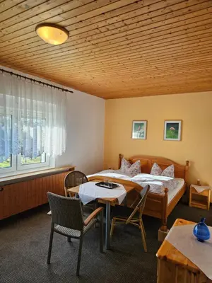 Ein Bett oder Betten in einem Zimmer der Unterkunft Gasthof Bergquelle