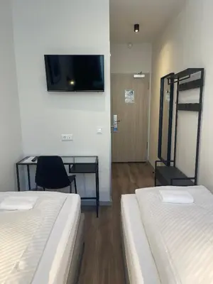 Ein Bett oder Betten in einem Zimmer der Unterkunft Motel Blue - Minimalist Boutique Hotel
