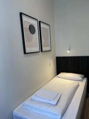 Ein Bett oder Betten in einem Zimmer der Unterkunft Motel Blue - Minimalist Boutique Hotel