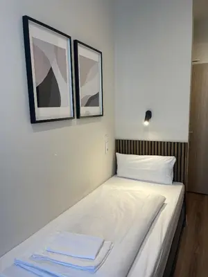 Ein Bett oder Betten in einem Zimmer der Unterkunft Motel Blue - Minimalist Boutique Hotel