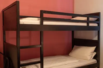 Ein Bett oder Betten in einem Zimmer der Unterkunft Hotel-Pension Charlottenburg