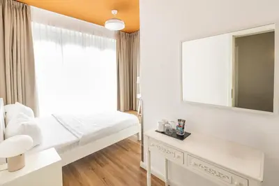 Ein Bett oder Betten in einem Zimmer der Unterkunft Midi Inn Parkhotel Mitte