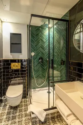 Ein Badezimmer in der Unterkunft Midi Inn Parkhotel Mitte