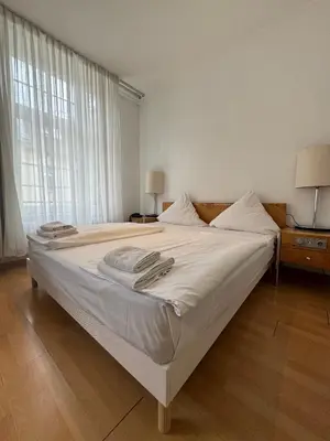 Ein Bett oder Betten in einem Zimmer der Unterkunft Erlanger Hof