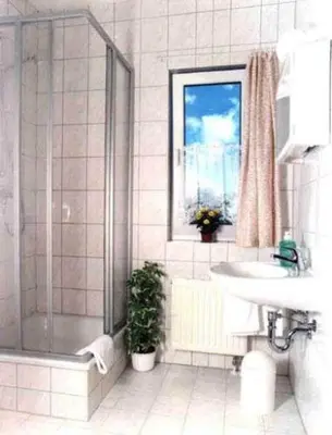 Ein Badezimmer in der Unterkunft Hotel garni Zur Mühle