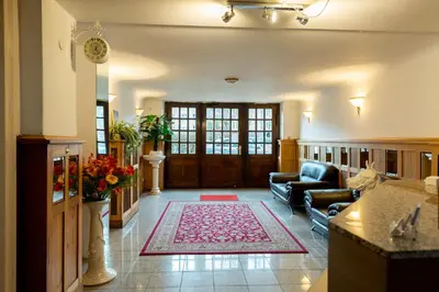 Ein Sitzbereich in der Unterkunft Hotel Pension Dahlem