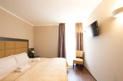 Ein Bett oder Betten in einem Zimmer der Unterkunft Hotel Delta am Potsdamer Platz