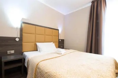 Ein Bett oder Betten in einem Zimmer der Unterkunft Hotel Delta am Potsdamer Platz
