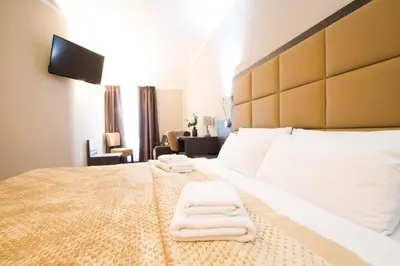 Ein Bett oder Betten in einem Zimmer der Unterkunft Hotel Delta am Potsdamer Platz