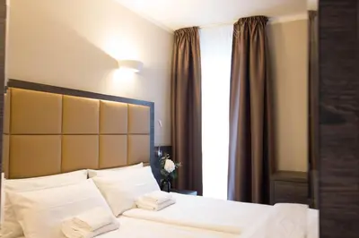 Ein Bett oder Betten in einem Zimmer der Unterkunft Hotel Delta am Potsdamer Platz