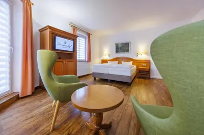 Ein Bett oder Betten in einem Zimmer der Unterkunft Hotel Fürstenhof
