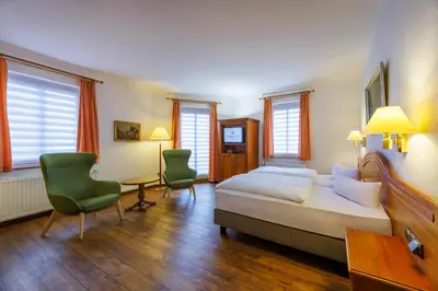 Ein Bett oder Betten in einem Zimmer der Unterkunft Hotel Fürstenhof
