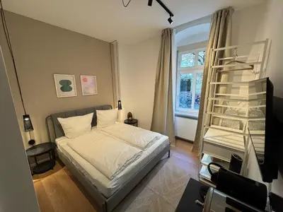 Ein Bett oder Betten in einem Zimmer der Unterkunft Cozy Studio Apartments In Berlin Prenzlauer Berg