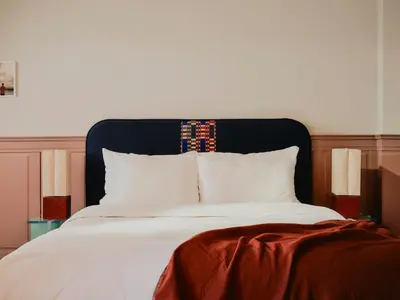 Ein Bett oder Betten in einem Zimmer der Unterkunft The Dean Berlin