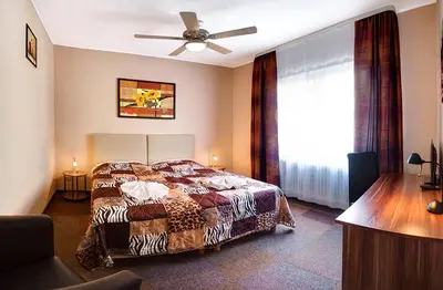 Ein Bett oder Betten in einem Zimmer der Unterkunft Hotel Kallmeyer