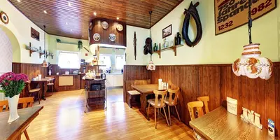 Ein Restaurant oder anderes Speiselokal in der Unterkunft Hotel Kallmeyer