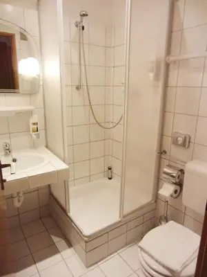 Ein Badezimmer in der Unterkunft Hotel Kallmeyer