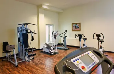 Das Fitnesscenter und/oder die Fitnesseinrichtungen in der Unterkunft Wyndham Garden Berlin Mitte