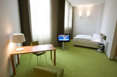 Ein Bett oder Betten in einem Zimmer der Unterkunft Wyndham Garden Berlin Mitte
