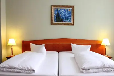 Ein Bett oder Betten in einem Zimmer der Unterkunft Wyndham Garden Berlin Mitte