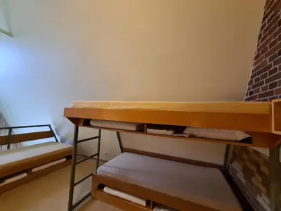 Ein Etagenbett oder Etagenbetten in einem Zimmer der Unterkunft Jugendgästehaus St.-Michaels-Heim