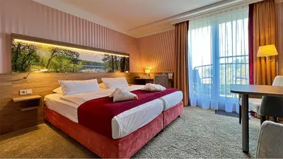 Ein Bett oder Betten in einem Zimmer der Unterkunft Hotel & SPA Sommerfeld - Adults Only