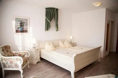 Ein Bett oder Betten in einem Zimmer der Unterkunft Flair Hotel Reuner