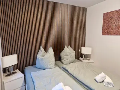 Ein Bett oder Betten in einem Zimmer der Unterkunft Pension Stechlinsee