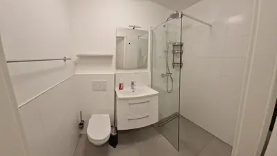 Ein Badezimmer in der Unterkunft Pension Stechlinsee