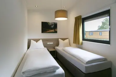 Ein Bett oder Betten in einem Zimmer der Unterkunft Tropical Islands Resort