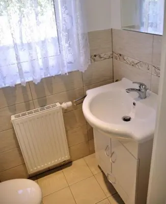 Ein Badezimmer in der Unterkunft La Vida Suite