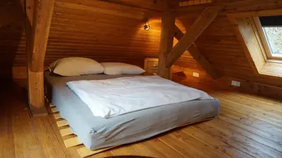 Ein Bett oder Betten in einem Zimmer der Unterkunft Hanghaus der Villa Oderblick