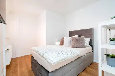 Ein Bett oder Betten in einem Zimmer der Unterkunft El Gigante