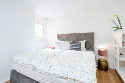 Ein Bett oder Betten in einem Zimmer der Unterkunft El Gigante