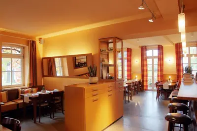 Ein Restaurant oder anderes Speiselokal in der Unterkunft Alte Schule Reichenwalde