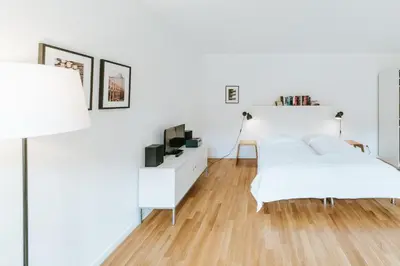 Ein Bett oder Betten in einem Zimmer der Unterkunft Josty Brauerei Appartements