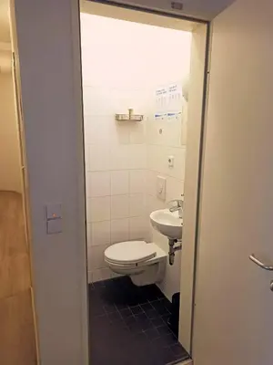 Ein Badezimmer in der Unterkunft Puschkin Rooms
