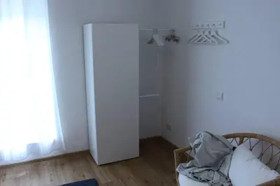 Ein Bett oder Betten in einem Zimmer der Unterkunft FeWo 