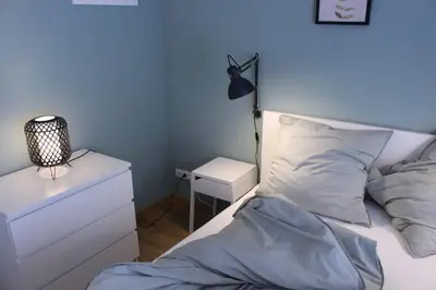 Ein Bett oder Betten in einem Zimmer der Unterkunft FeWo 